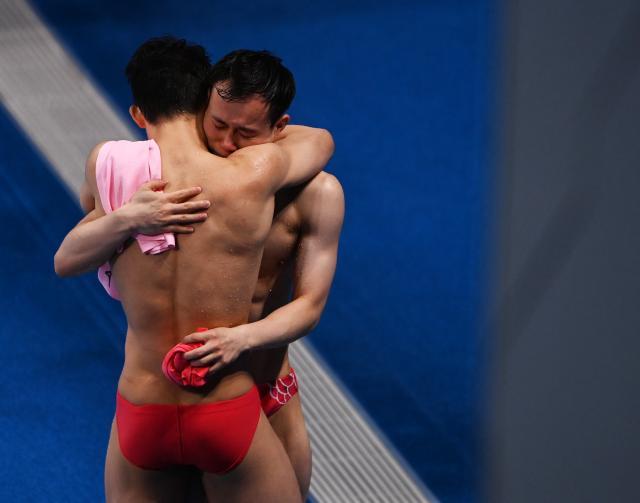 体育软件-梦之队男单3米板揽金银 “绝代双骄”捍卫霸主地位